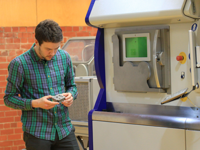 RMIT researcher Dr Alexander Medvedev examines an additive manufactured ballistic target. RMIT researcher Dr Alexander Medvedev examines an additive manufactured ballistic target.