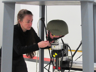 Dr Melanie Franklyn adjusts the headform used for testing.