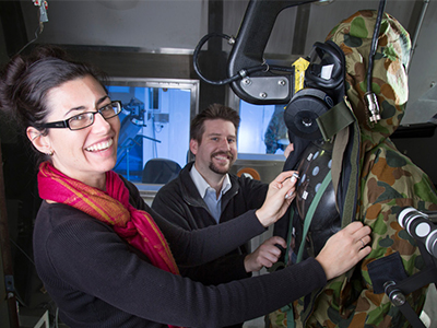 Julia Freeman with colleague Brady Gentle in the environmental test chamber. Julia Freeman with colleague Brady Gentle in the environmental test chamber.