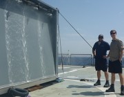 Shannon Keough and Ian Kermonde on the deck of the Greek vessel HS Prometheus, with the Wandjina test article. 