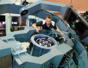 A scientist working on hardware-in-the-loop simulation